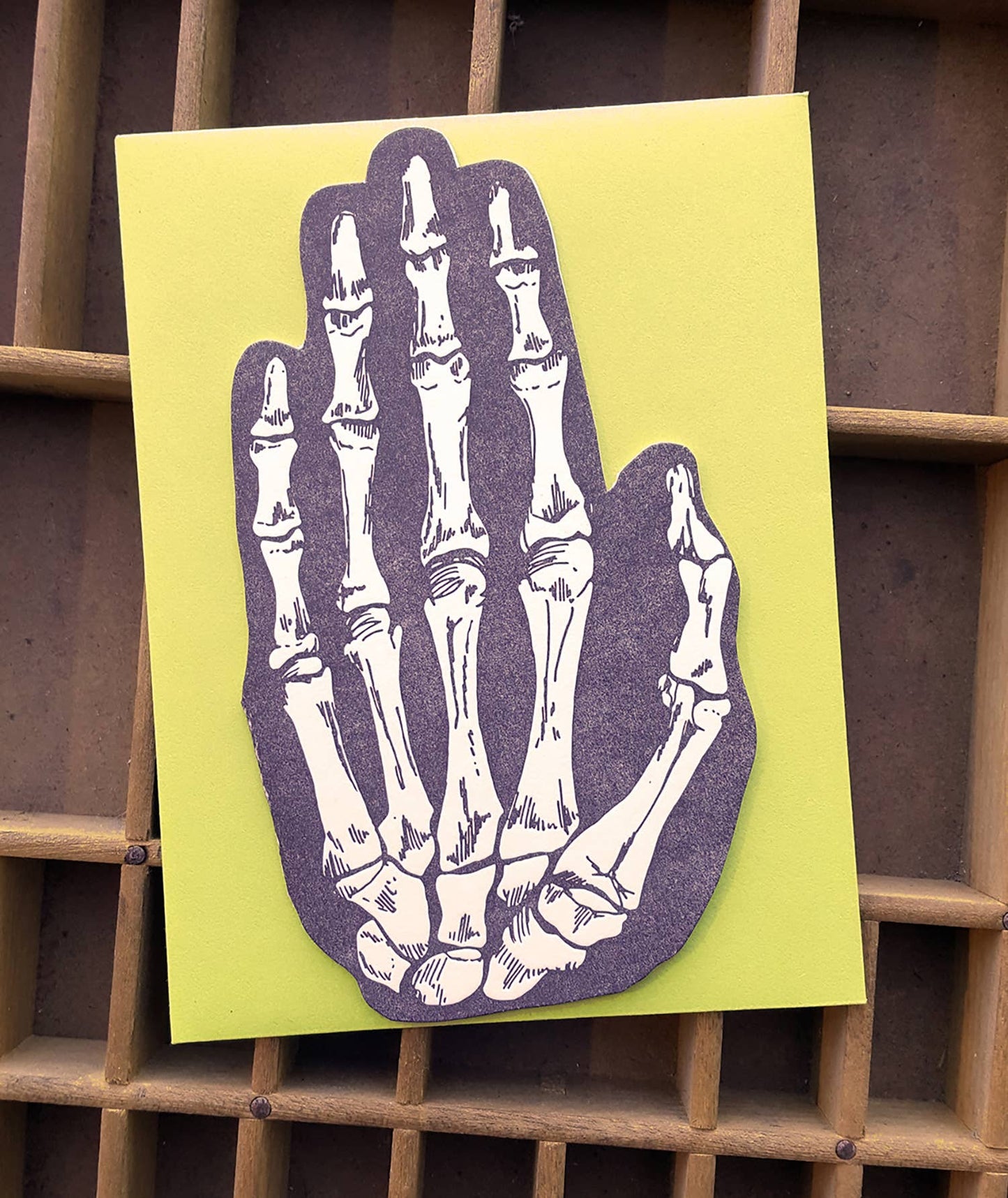 Skeleton hand shaped card